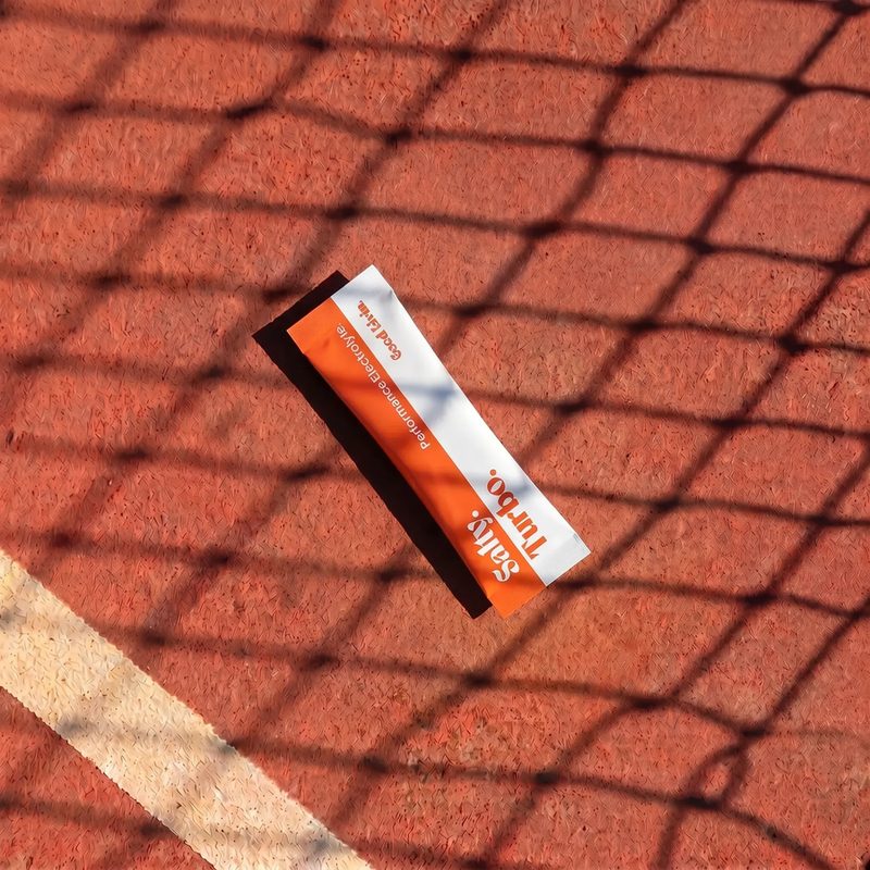 A Salty Turbo stick pack lying on an orange running track